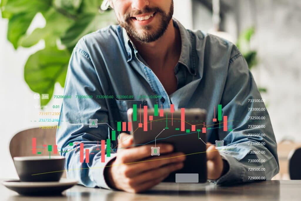 Bitpanda Depot: Mann handelt an der Börse